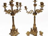 pair of antique brass candelabs with birds and flowers