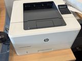 a printer that is sitting on top of a desk