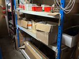 a room with a lot of boxes and boxes on the shelves
