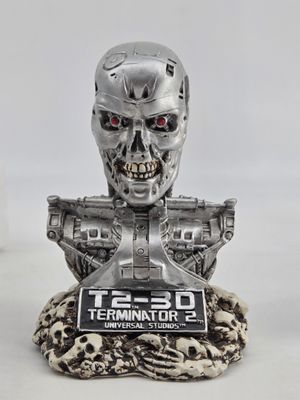 a close up of a busturine of a robot with red eyes