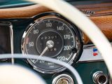 a close up of a car dashboard with a speedometer
