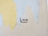 a picture of a yellow and blue painting on the wall