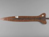 an image of a knife on a gray surface