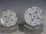 a lot of plates that are stacked on top of each other