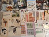 many different types of stamps and stamps on the table