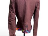 the back of a purple jacket on a mannequin mannequin mannequin mannequin mannequin mannequin mannequin mannequin