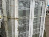 a large white window sitting on top of a pallet