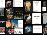 a lot of books that are on a black background