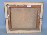 an old picture frame with a picture of a cat in it