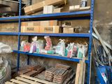 a shelf full of different types of wood in a warehouse