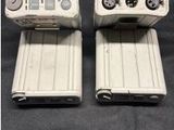 two mp3 players that are sitting on a table