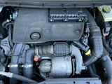 the engine of a car with its hood open and the hood down