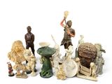 a lot of figurines that are sitting on a table