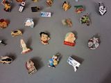 a lot of pins that are on a table