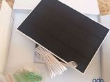a small solar panel in a box on a table