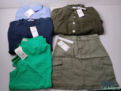 three pairs of green, blue, and green shorts and a blue shirt
