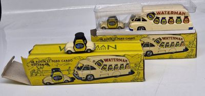two toy cars that are sitting on top of each other