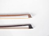 three different types of bows on a white surface