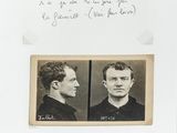an old black and white photo of two men, one with a mustache and the other with a mustache
