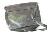 a brown leather bag with a strap on a white surface