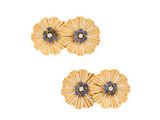 two pairs of gold tone flower earrings with blue stones