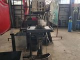 a picture of a machine shop with a lot of tools