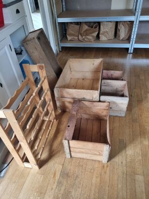 several wooden crates sitting on the floor in a room