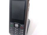 an image of a cell phone sitting on a stand