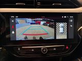 the view of a car ' s rear view camera from the driver ' s seat