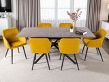 une table à manger avec des chaises jaunes dans un salon moderne