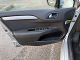 a car door with the door handle open and the door handle open