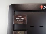 a close up of a display case with cards on it