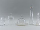 a lot of glass items that are sitting on a table