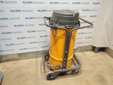 a yellow trash can sitting on a cart in a room