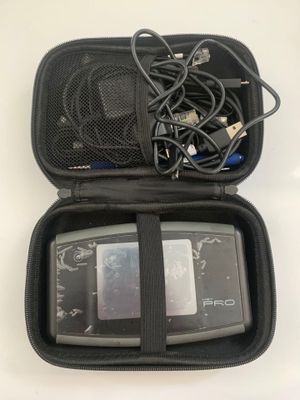 a black case with wires in it on a white table