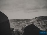 a black and white photo of a view of a mountain