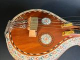 an image of a musical instrument that is on a table