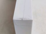 a close up of a white box on a table