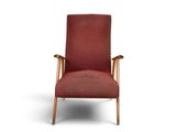 an image of a red upholstered chair with a wooden frame