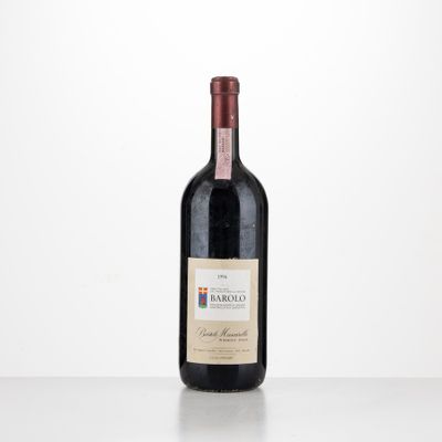 a bottle of red wine sitting on top of a table