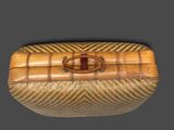an image of a bamboo box with a ring on it