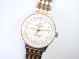 an image of a close up of a wrist watch on a white surface