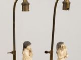 pair of antique chinese figurines of a man and a woman on a pedestal
