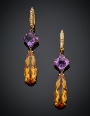 une paire de boucles d'oreilles en améthorate et diamants