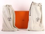 a pair of bags sitting next to each other on top of a table