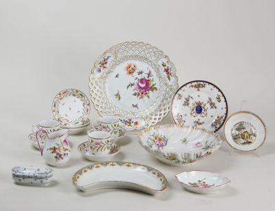 many different types of plates and bowls on the table