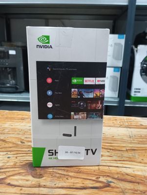 a close up of a box of a tv on a table