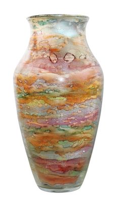 a glass vase with a multicolored design on it