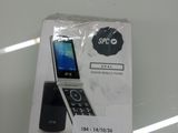 a box with a cell phone in it sitting on a table