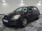 a picture of a black car parked on a checkered floor